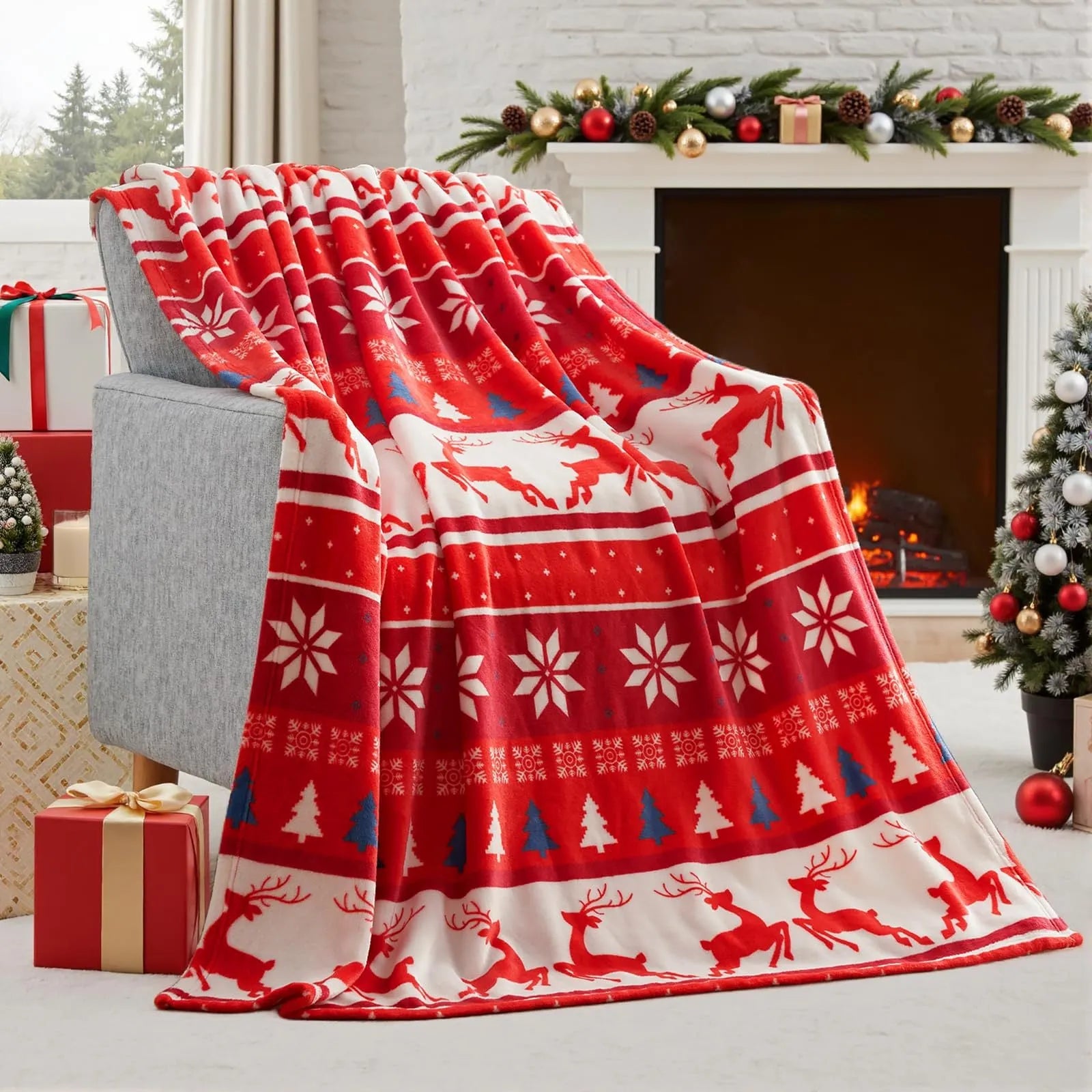 Soft red plush Christmas blanket draped over a bed, showing its flannel texture.