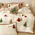 Bright yellow Christmas tree fleece-lined duvet cover set with embroidery on a bed.