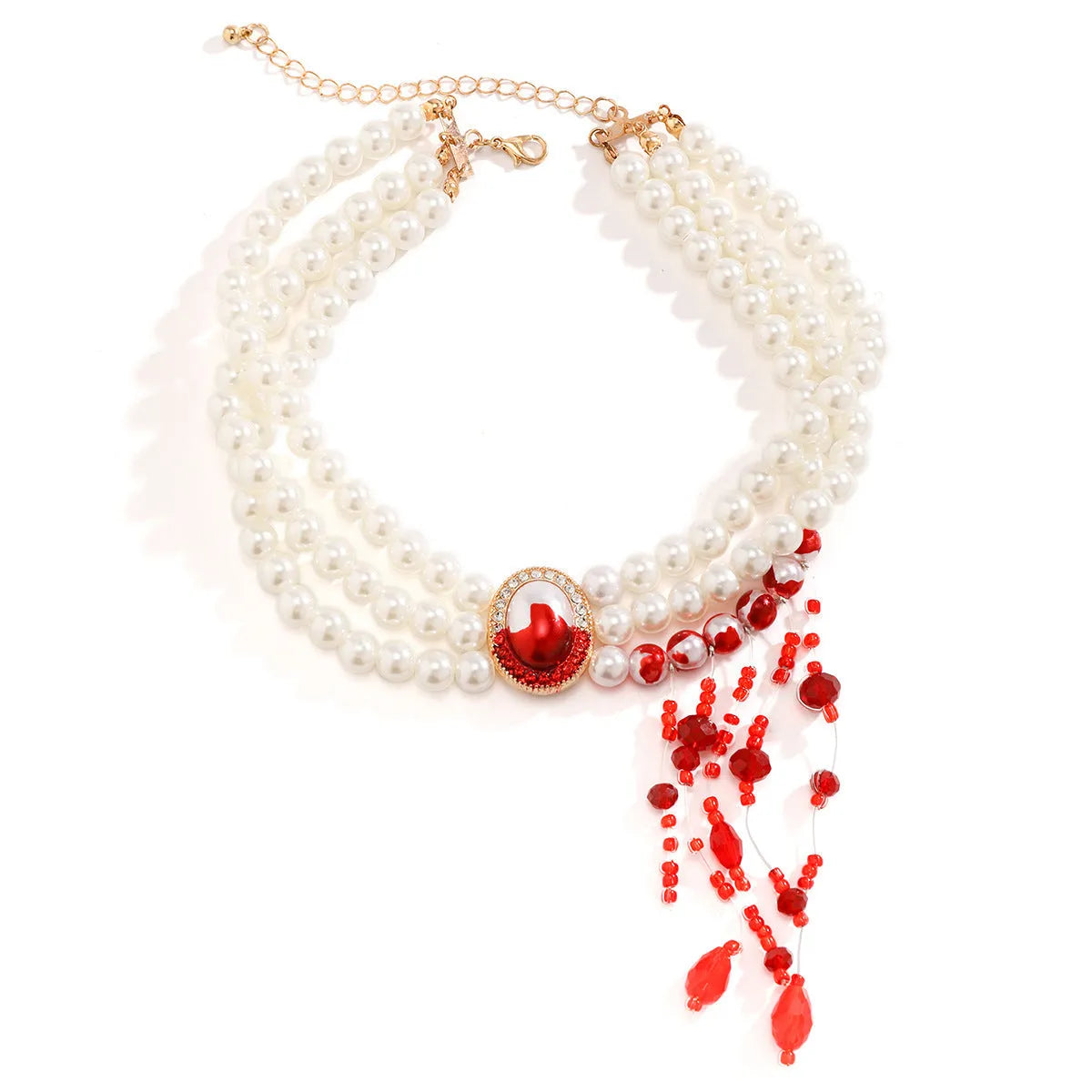 Halloween jewellery set with gold tone necklace, bracelet, and earrings featuring pearl accents