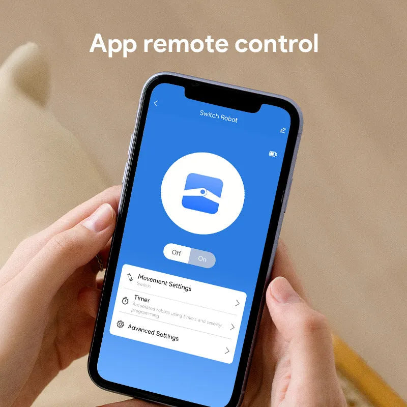 White Bluetooth thumb remote control with rocker arm switch, shown on a person's thumb, dimensions 53mm by 29mm.