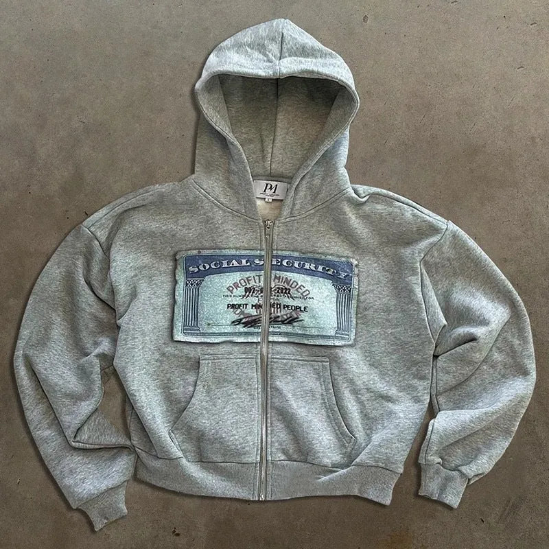 A loose-fitting black hooded zip-up jacket with a letter print design on the front.