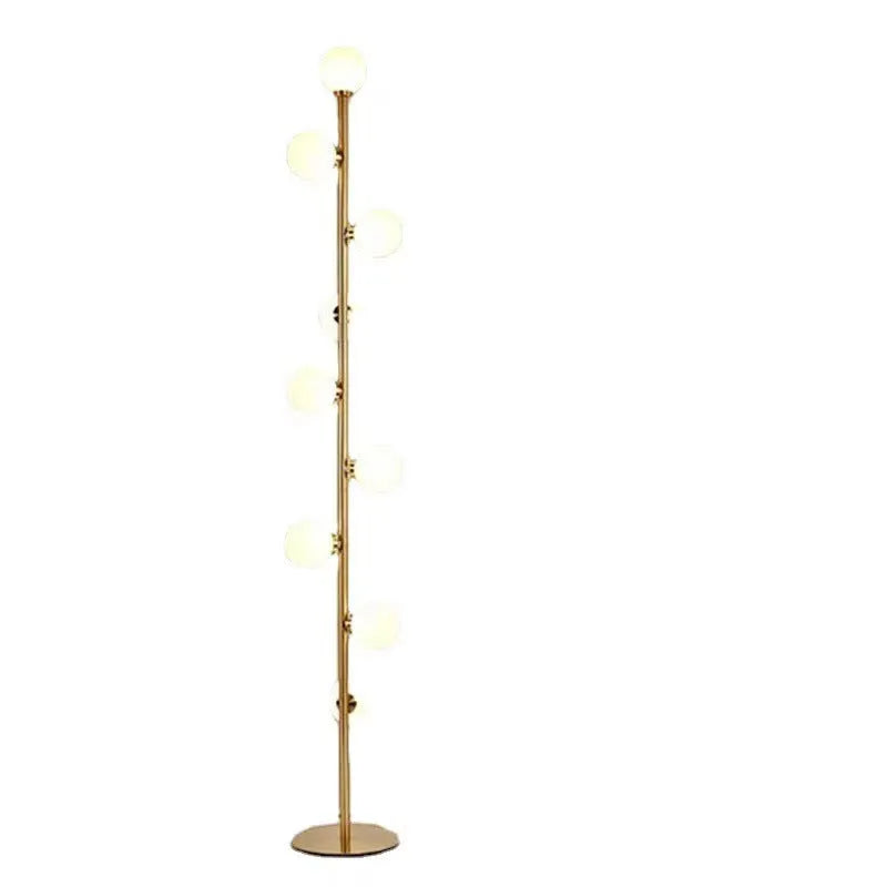 Tall minimalist Nordic floor lamp with wrought iron frame, glass shade, and circular marble base.
