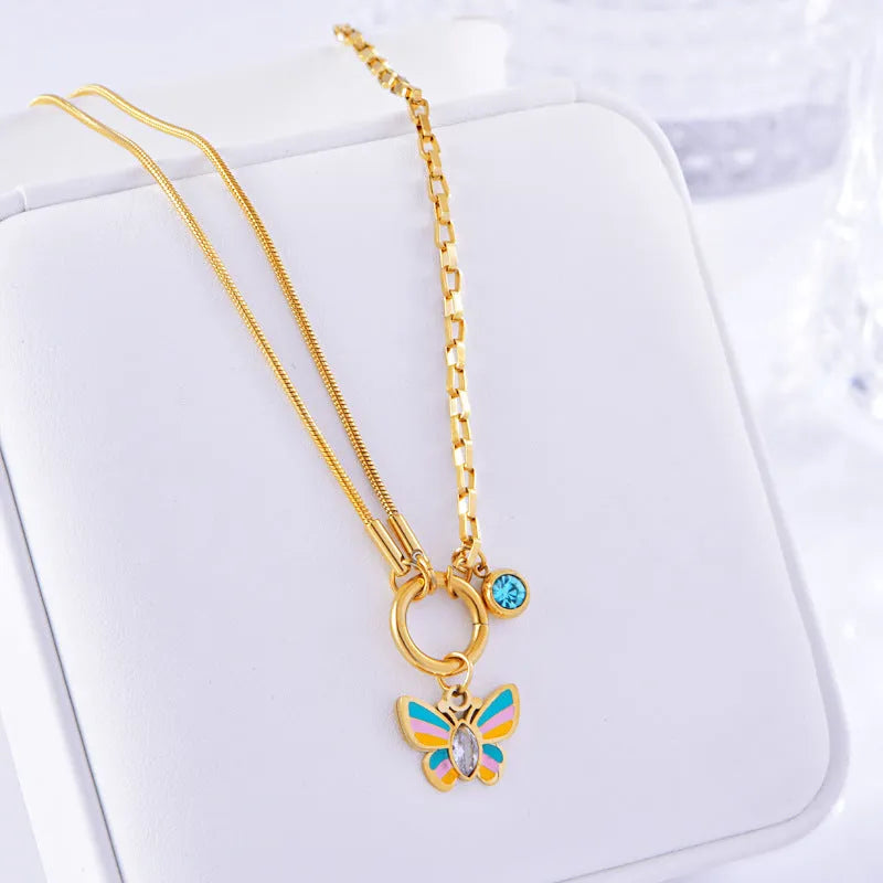 Gold titanium steel butterfly necklace and bracelet set with colourful epoxy pendants on snake bones chains