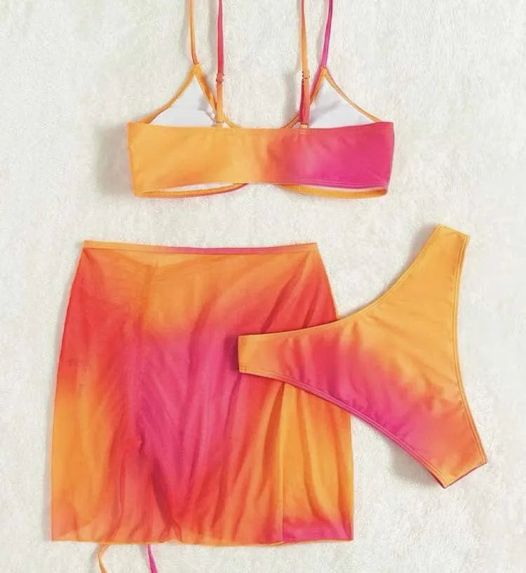 Women's orange three-piece swimsuit with loop buckle hollow suspender and printed gradient pattern