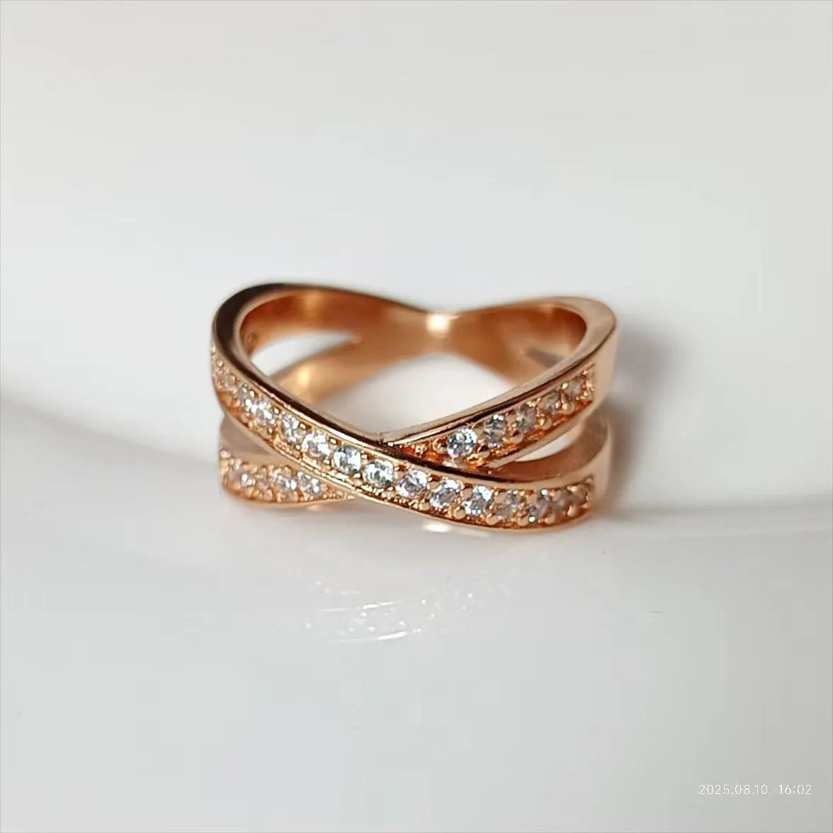 Copper ring with a metal cross design, micro-inlaid zircon, and electroplated silver or rose gold finish.