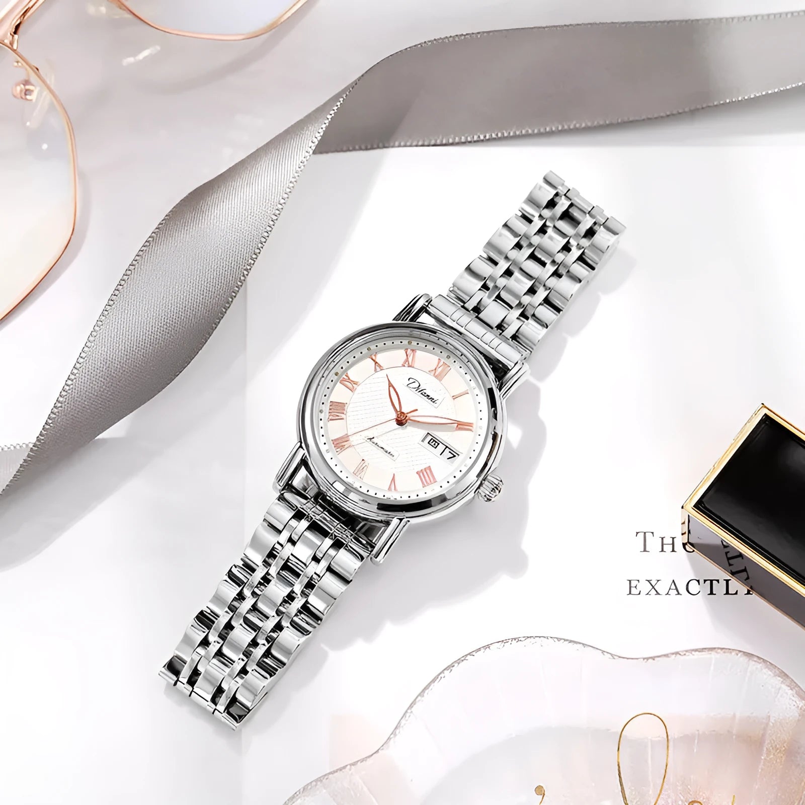 Women's automatic watch with 12mm case on stainless steel or leather strap, white or black dial