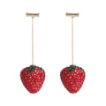 Geometric strawberry-shaped zinc alloy earrings with spot drill texture, shown in red finish with butterfly clasps.