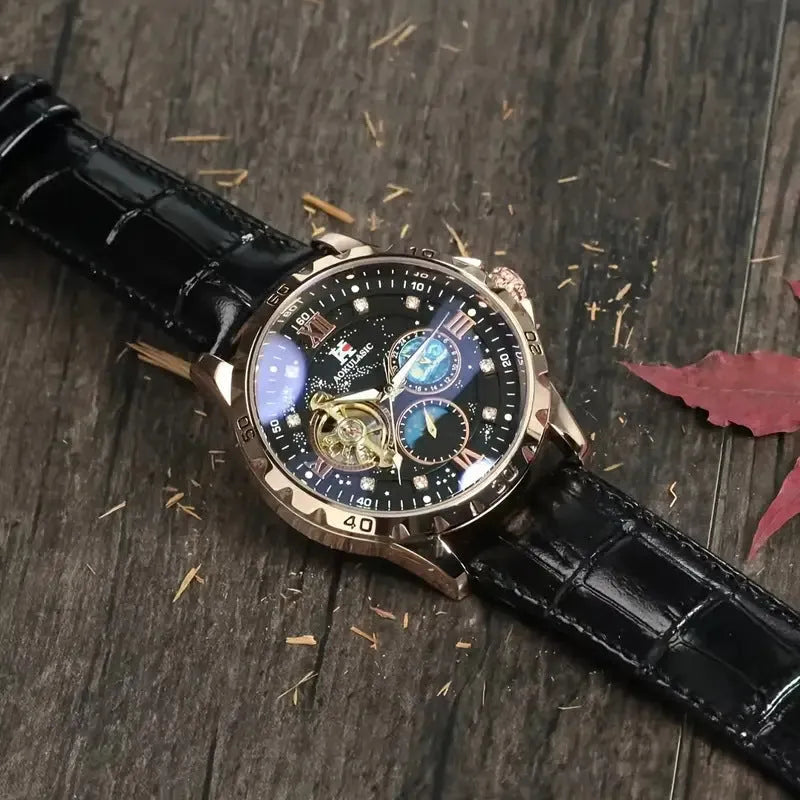 Men's black and rose gold automatic skeleton watch with large dial and leather strap.