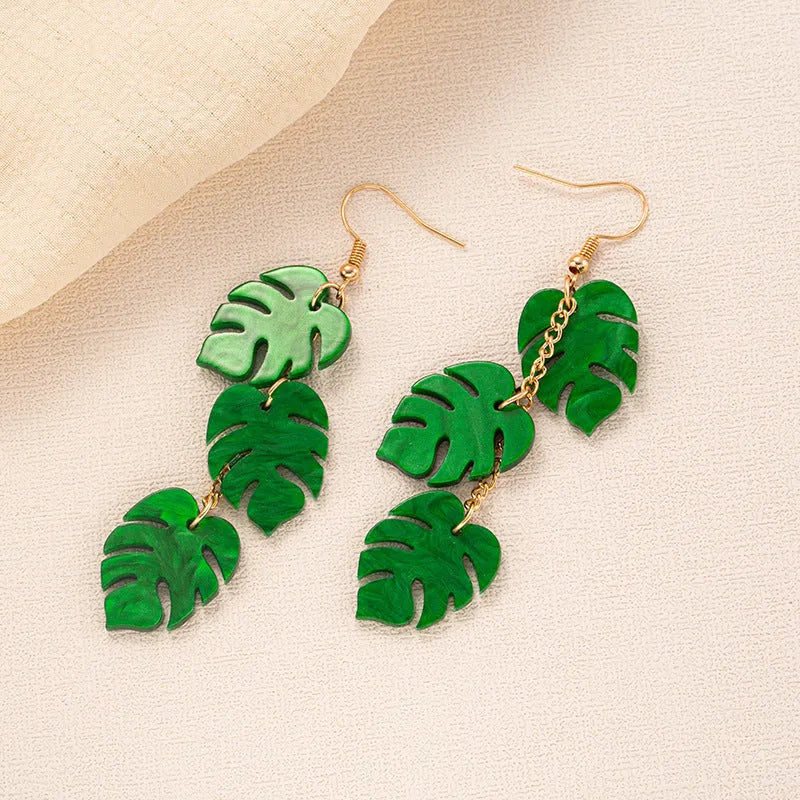 Acrylic drop earrings with coconut design on alloy hook in one of five colour styles.