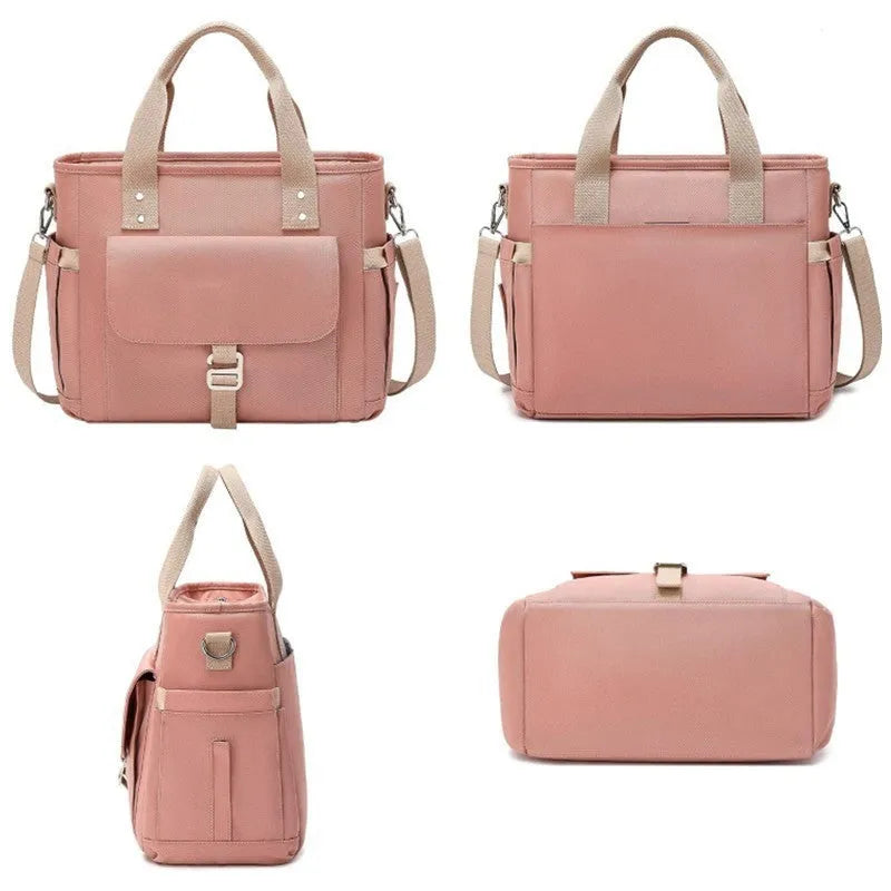 Portable cube-shaped Oxford cloth picnic bag with a removable shoulder strap and side pocket.