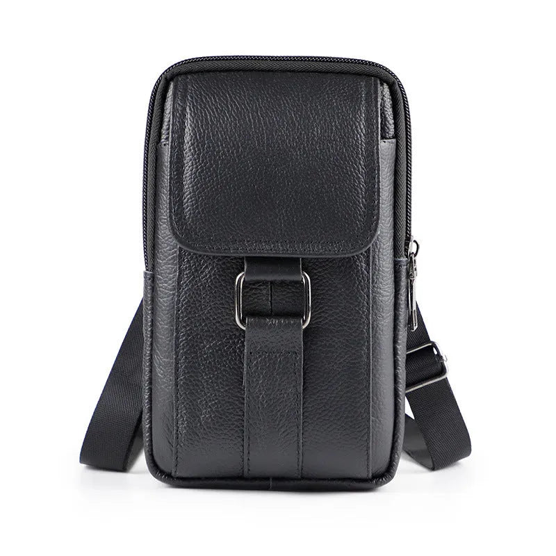 Men's black leather crossbody waist bag showing vertical square shape and lock detail.