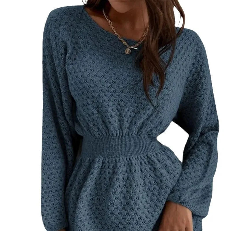 Blue women's knitted dress with crocheted flowers, a round neck, fitted waist, and long sleeves.