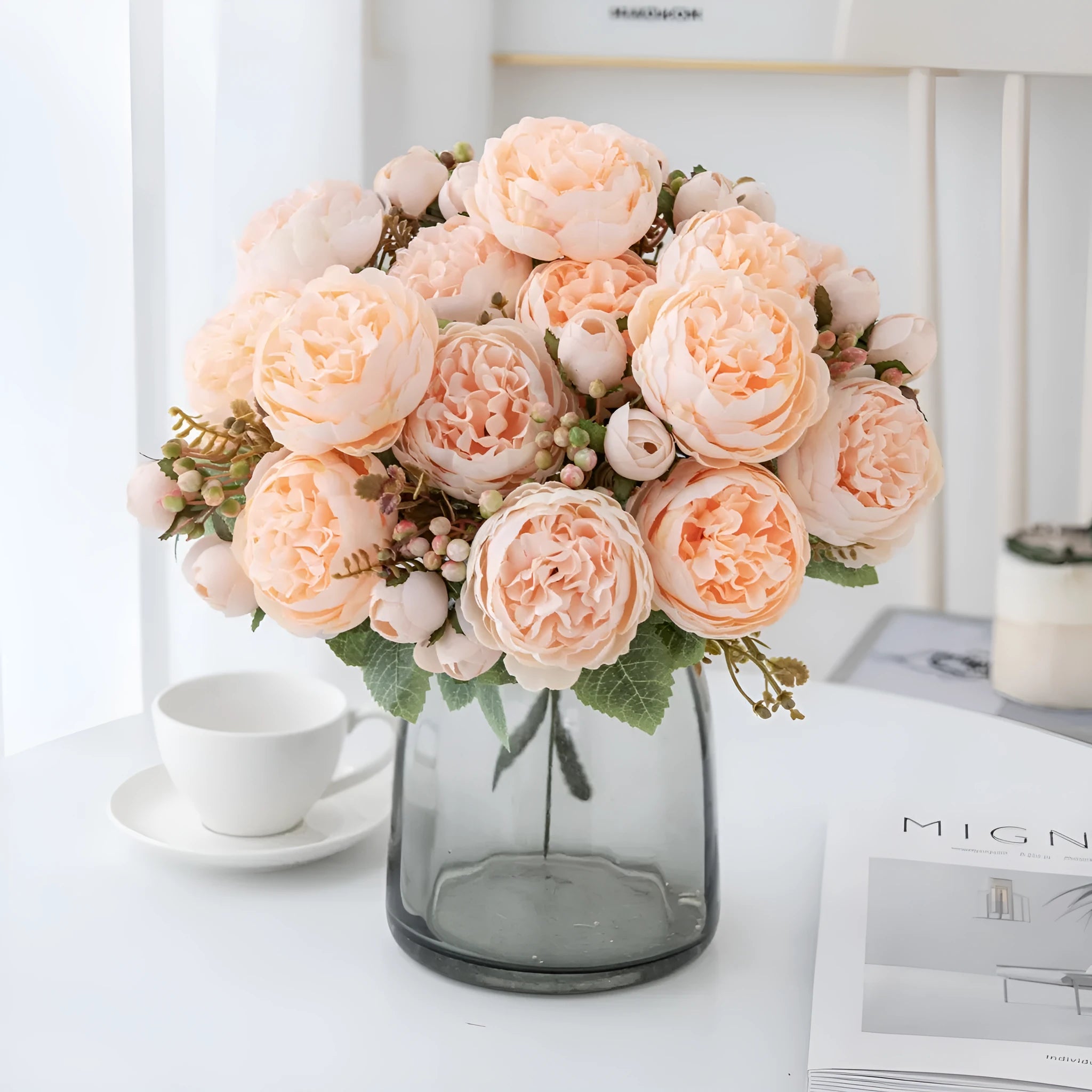 Artificial silk peony bouquet in a vase, showcasing weighted stems and champagne-coloured blooms.