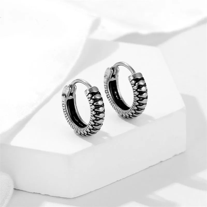 Geometric round titanium steel earrings with retro twist design and silver stripes