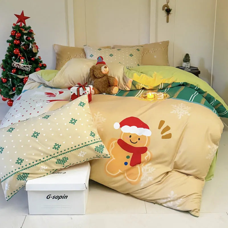 Christmas cartoon print bedding four-piece set on a bed, showing duvet cover and pillowcases in a festive pattern.