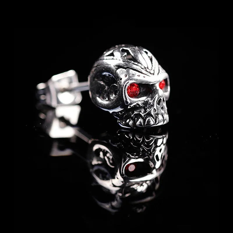 Skull stud earrings with red eye ghost head design and artificial gemstone inlay detailing