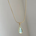 Retro blue and green water drop necklace with mixed gem pendant on snake bones chain