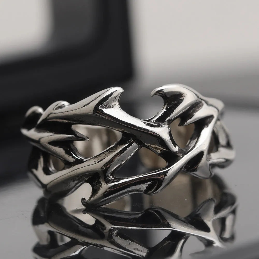 Copper men's ring with geometric thorn flower design and adjustable opening in J2150 thorns colour.
