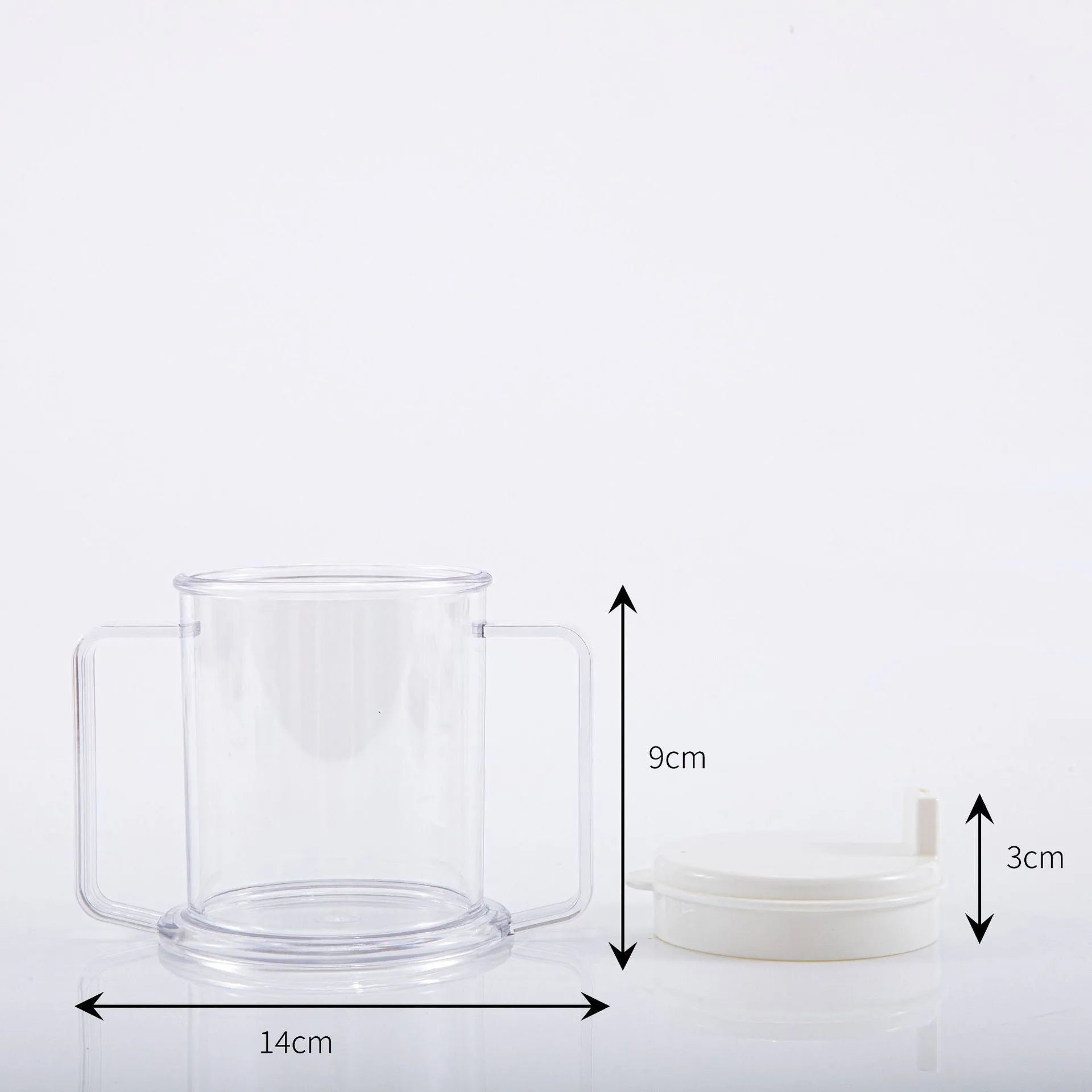 Transparent spill-proof plastic drinking cup on a plain background