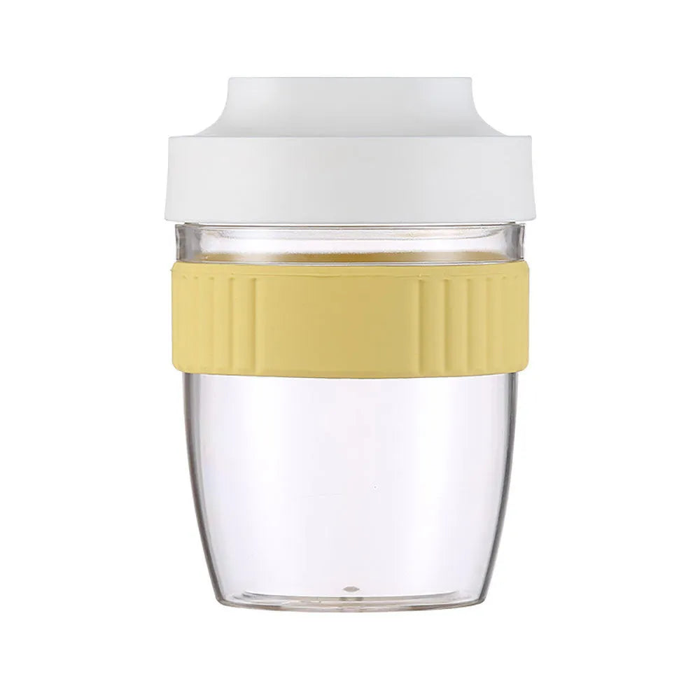 Green microwave-safe plastic salad cup with white lid and spoon, showing leak-proof seal.