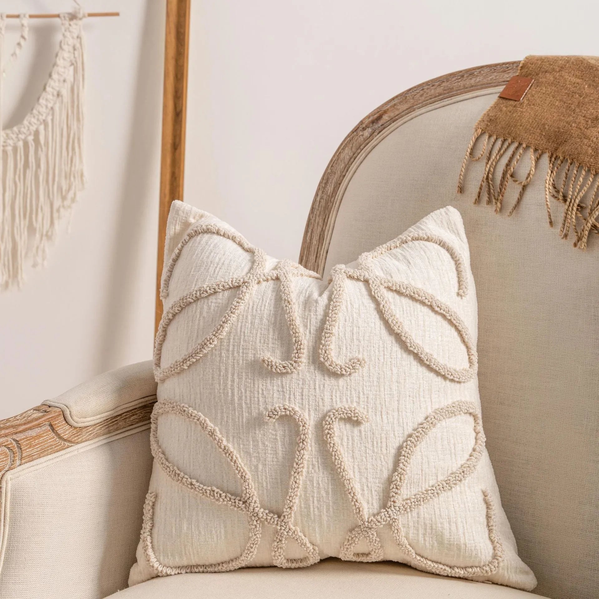 Knitted cushion cover with tassel edge detailing showing stripe pattern and pp cotton filler