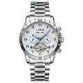Silver stainless steel men's automatic perpetual calendar watch with sapphire glass on a wrist.