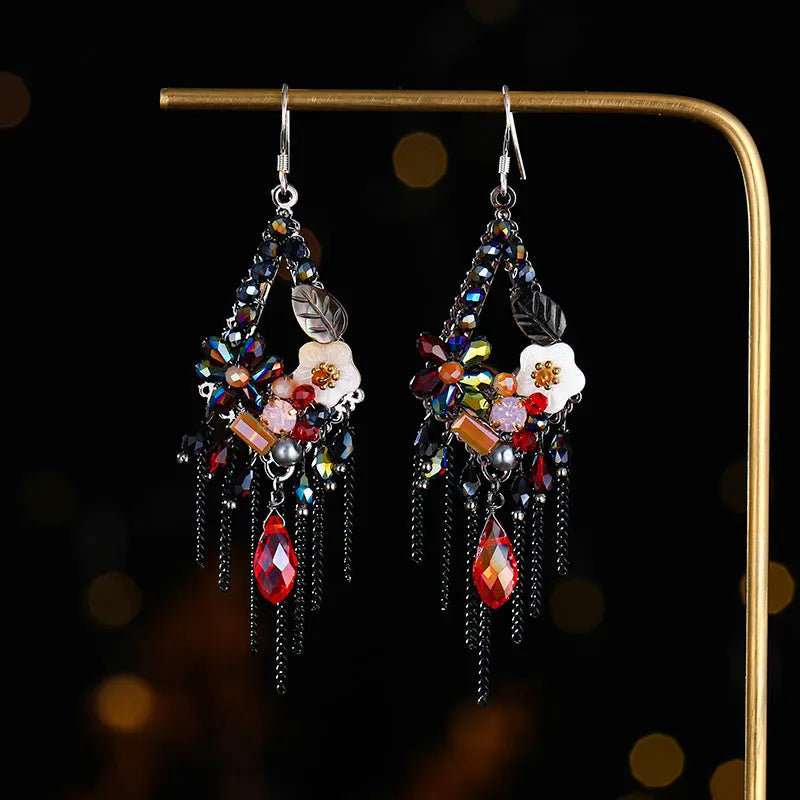 Bohemian style long earrings with hand-woven crystal details and alloy framework