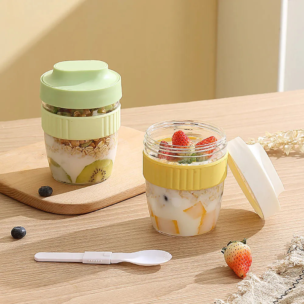 Green microwave-safe plastic salad cup with white lid and spoon, showing leak-proof seal.