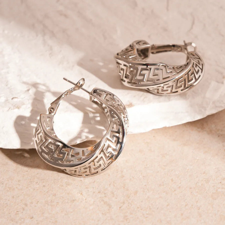 Gold and silver twisted round hollow geometric copper stud earrings for women