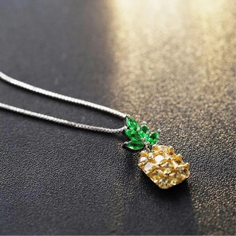 Silver geometric pineapple diamond pendant on a women's necklace, Korean fashion style.