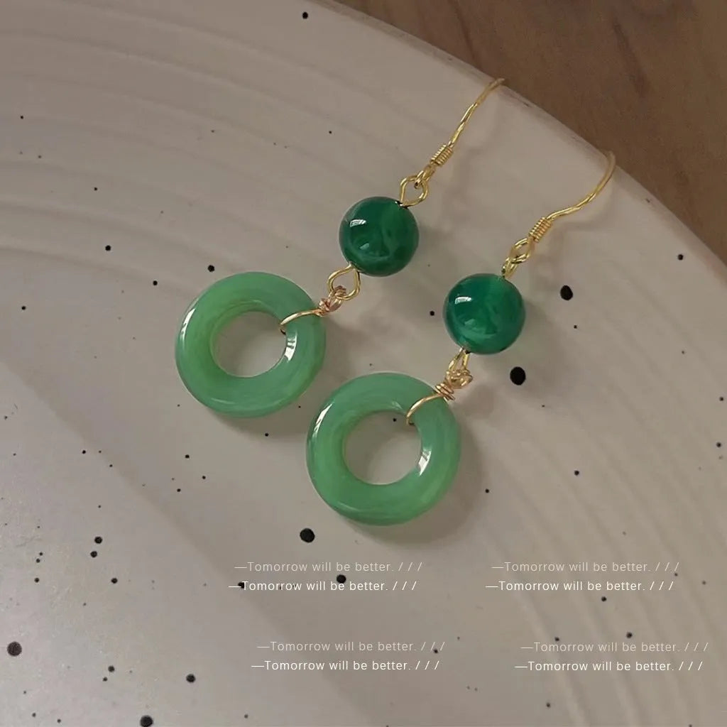 Green Chinese peace buckle earrings with geometric design and gold plating