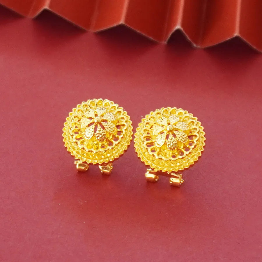 Gold-plated three-piece jewellery set with Middle Eastern flower design, showing necklace, pendant earrings, and ring.
