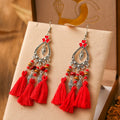 Metal leaf shaped drop earrings with multi-layer tassel and irregular stone ornament in electroplated finish