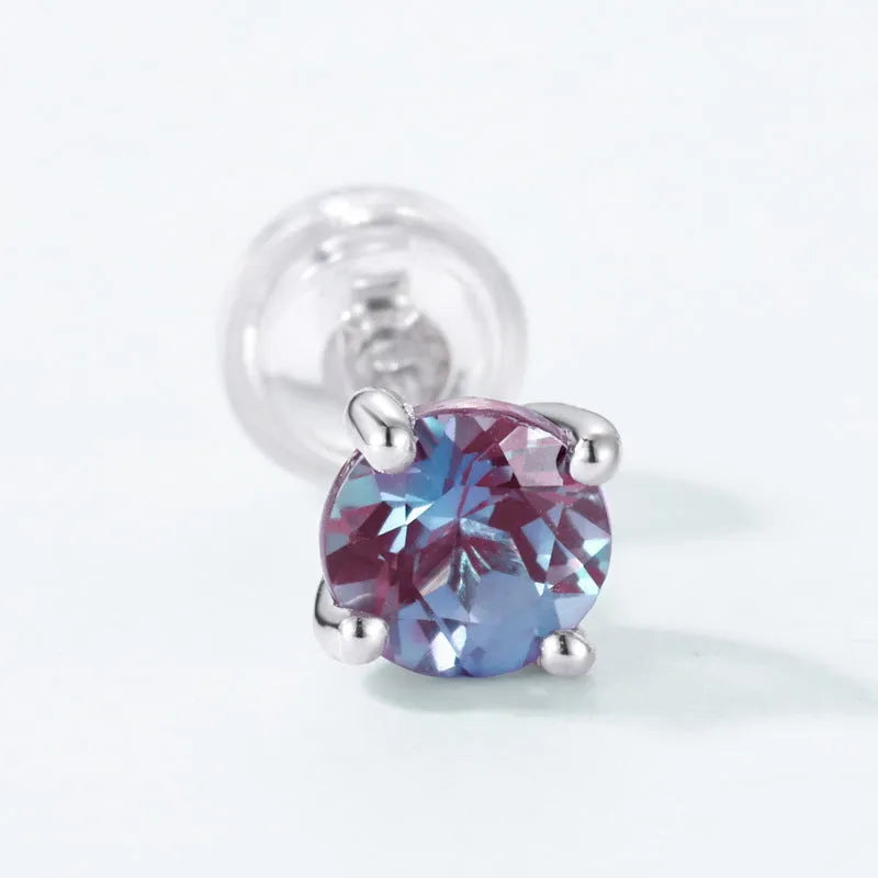 Simple geometric round ear studs with a cultivated Alexander stone in 925 silver.