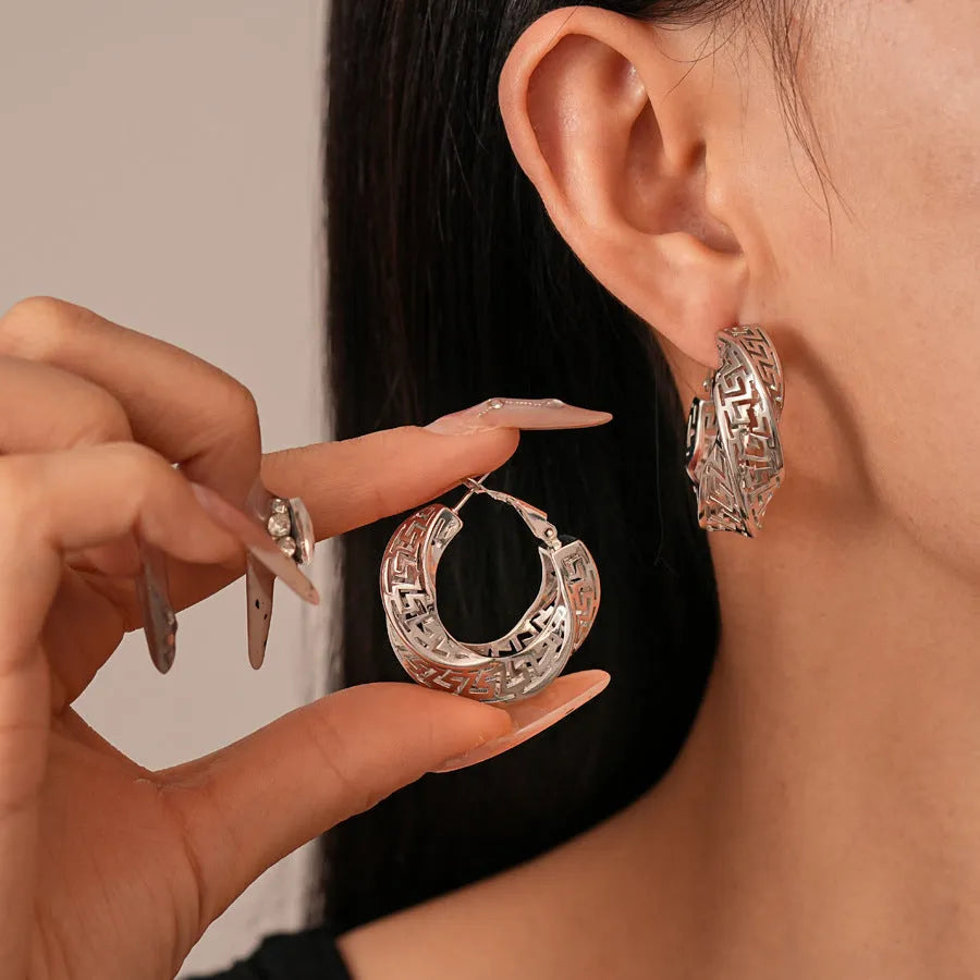 Gold and silver twisted round hollow geometric copper stud earrings for women
