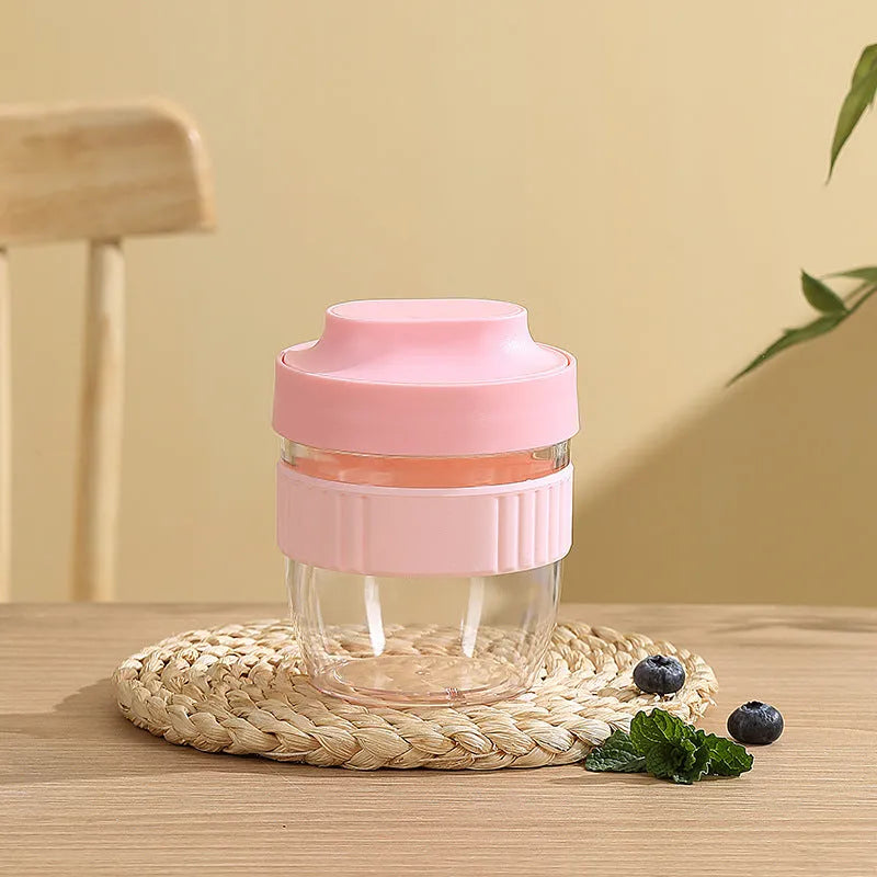 Green microwave-safe plastic salad cup with white lid and spoon, showing leak-proof seal.
