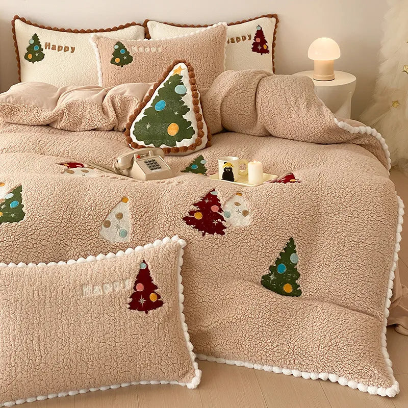 Bright yellow Christmas tree fleece-lined duvet cover set with embroidery on a bed.