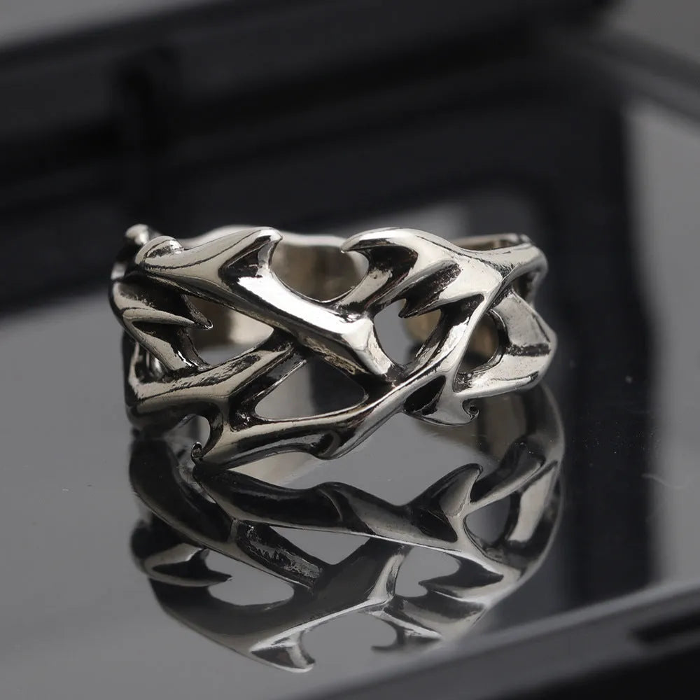Copper men's ring with geometric thorn flower design and adjustable opening in J2150 thorns colour.