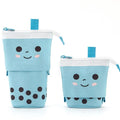 Canvas retractable pencil case with heart smiley face design in blue velvet milk tea colour, showing retractable pen holder