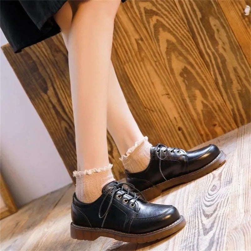 Preppy style retro Mary Jane women's shoes in black with round toe and front lace-up design