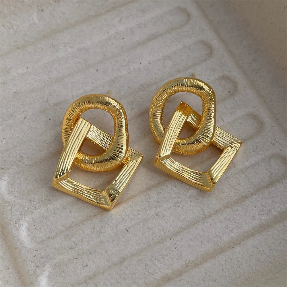 Retro geometric circle pendant earrings with 3.4cm height in gold or silver electroplated finish