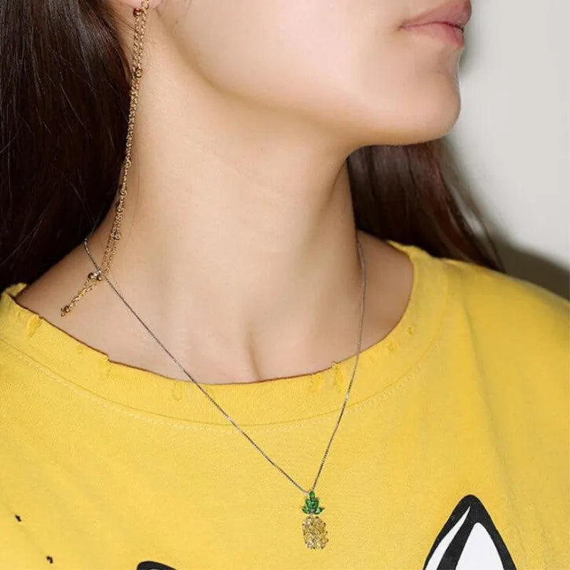 Silver geometric pineapple diamond pendant on a women's necklace, Korean fashion style.