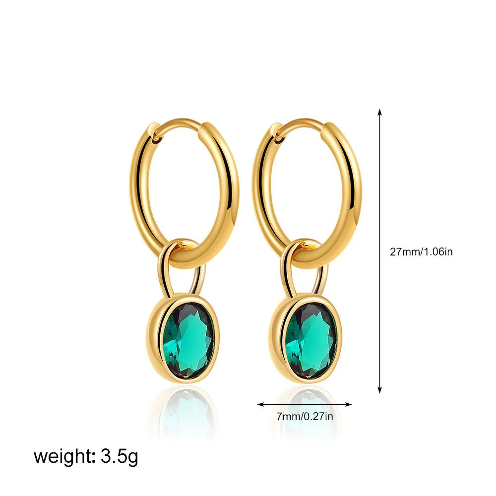 Women's oval zircon clip earrings in army green with polished copper setting on a white background.
