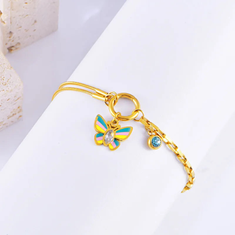 Gold titanium steel butterfly necklace and bracelet set with colourful epoxy pendants on snake bones chains