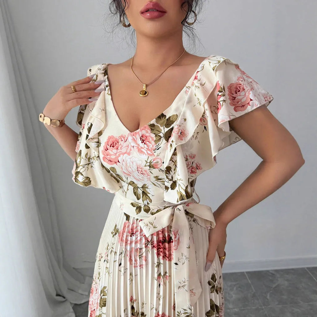 Apricot floral print V-neck dress with ruffled sleeves and a full swing skirt.