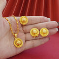 Gold-plated three-piece jewellery set with Middle Eastern flower design, showing necklace, pendant earrings, and ring.