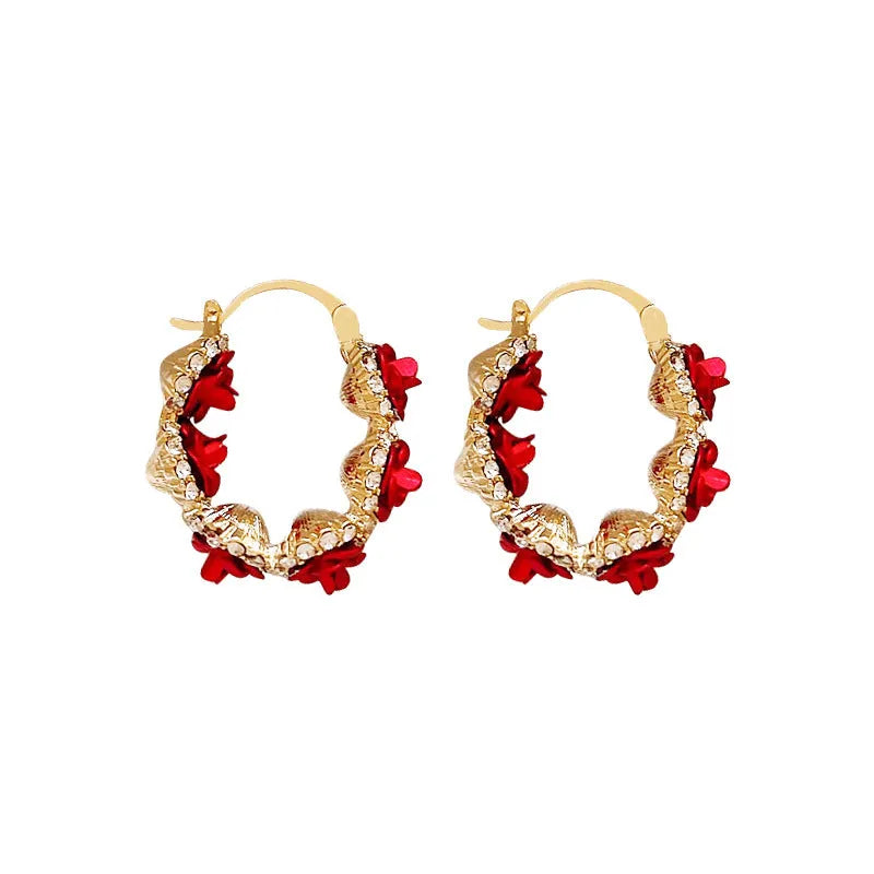 Red flower-shaped alloy ear clip earrings with rose design elements for women