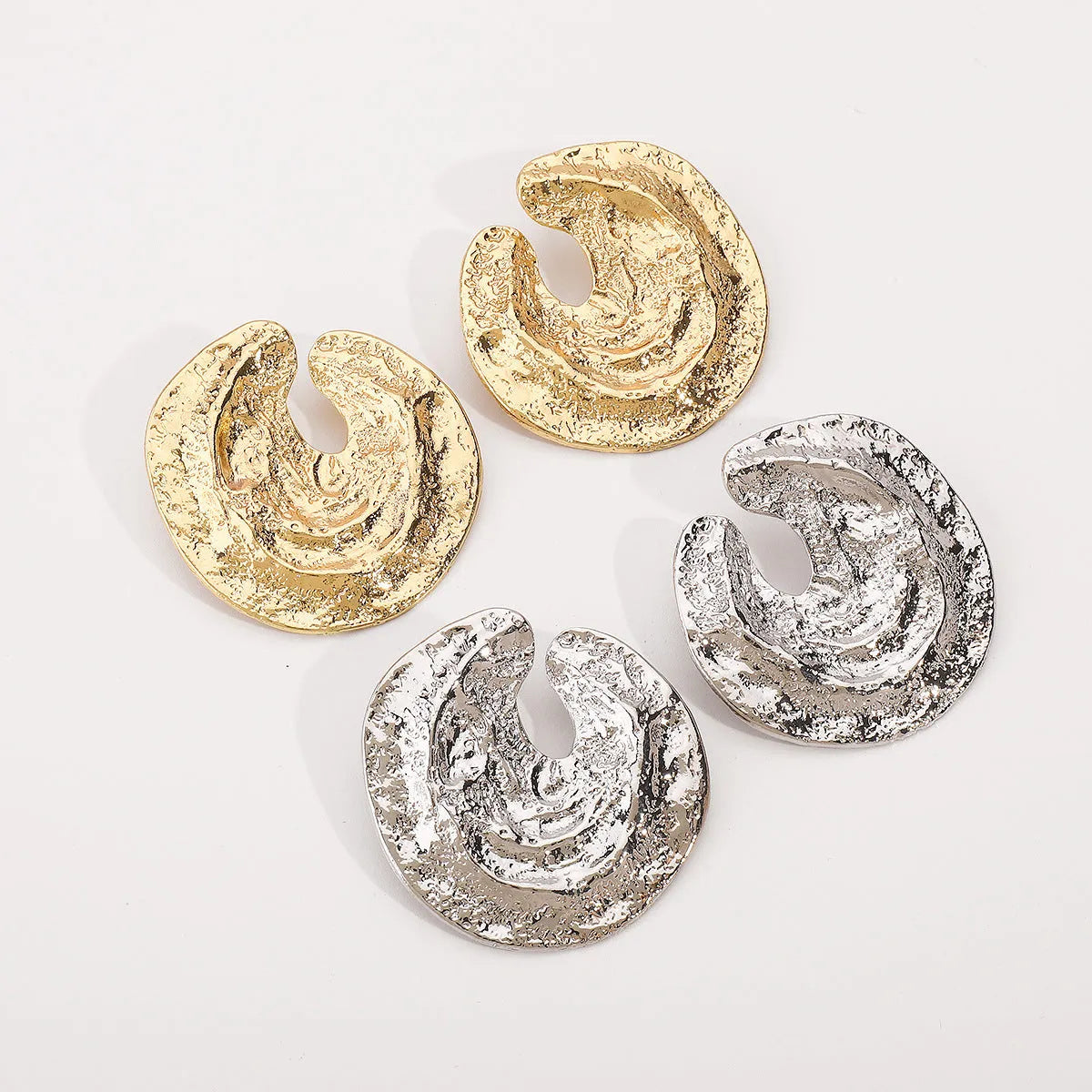 Women's geometric earrings with irregular pleats and concave-convex texture in gold or white finish