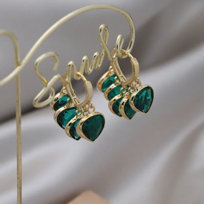Korean style green heart ear clip earrings with dancing glass pendant and artificial gemstones