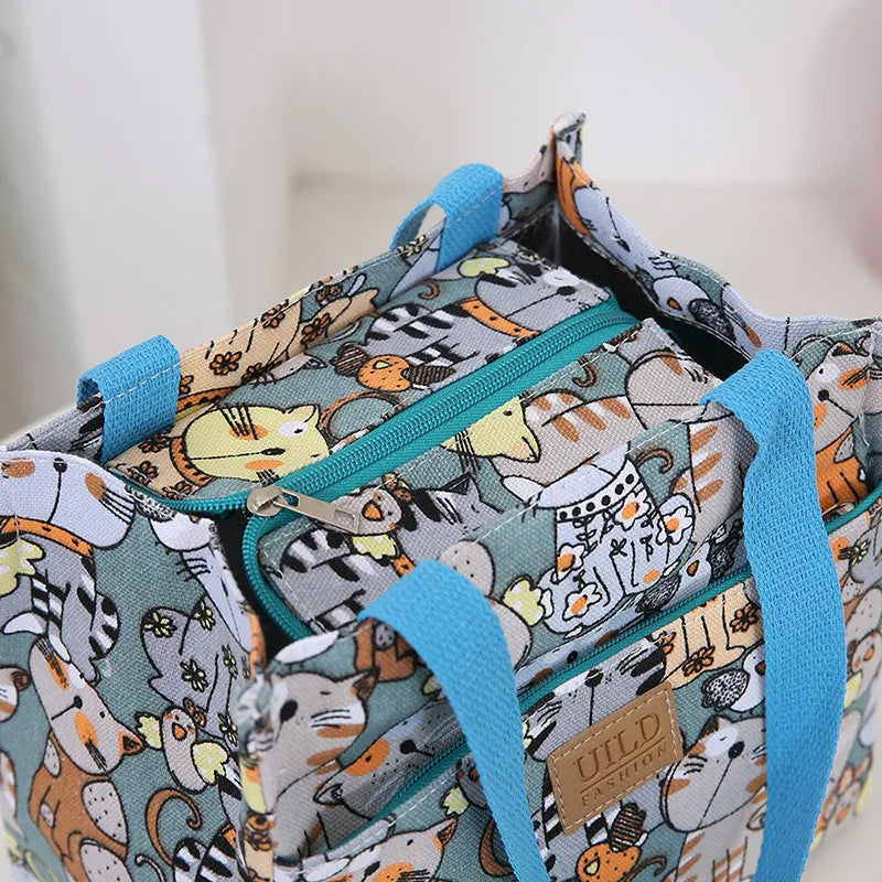Women's printed canvas tote bag in a horizontal square shape with floral and cat design options.